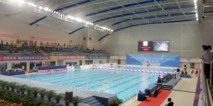 DaLian Swimming Center Ã¥bnede i maj 2013 i anledningen af de 13. Nationale Kinesiske Sportslege. FabricAir leverede 1.500 m tekstilkanaler til kÃ¸ling og opvarmning af de knap 50.000 m2 inkl. to konkurrencehaller, et opvarmningsbassin, samt gangarealerne rundt om svÃ¸mmehallerne.